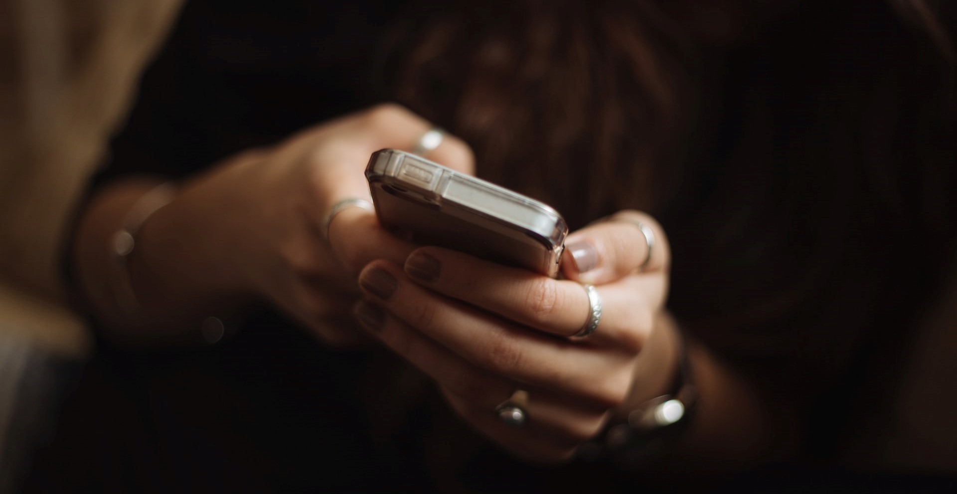 Woman's hands holding smartphone