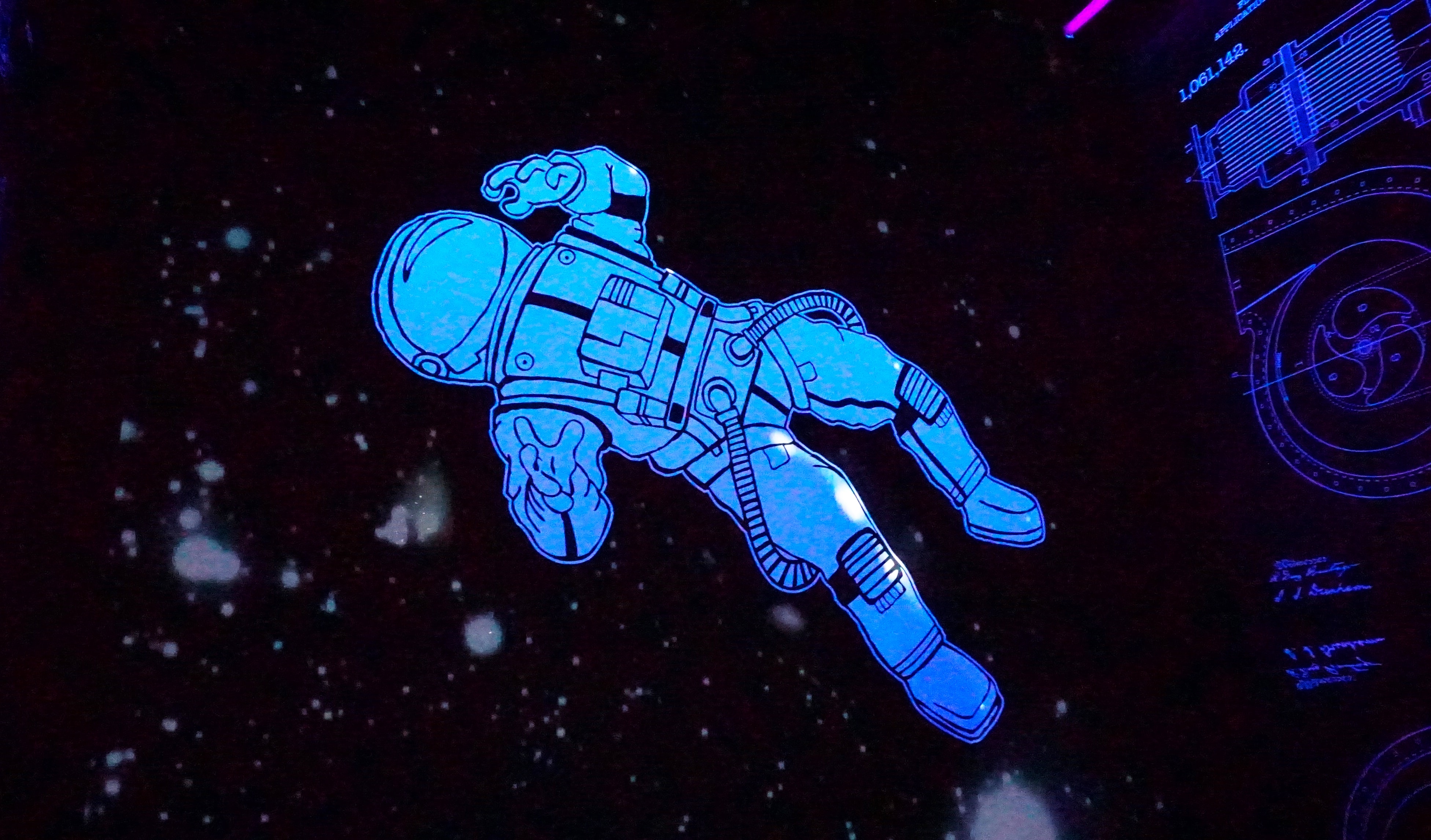 Drawing of an astronaut floating in space.