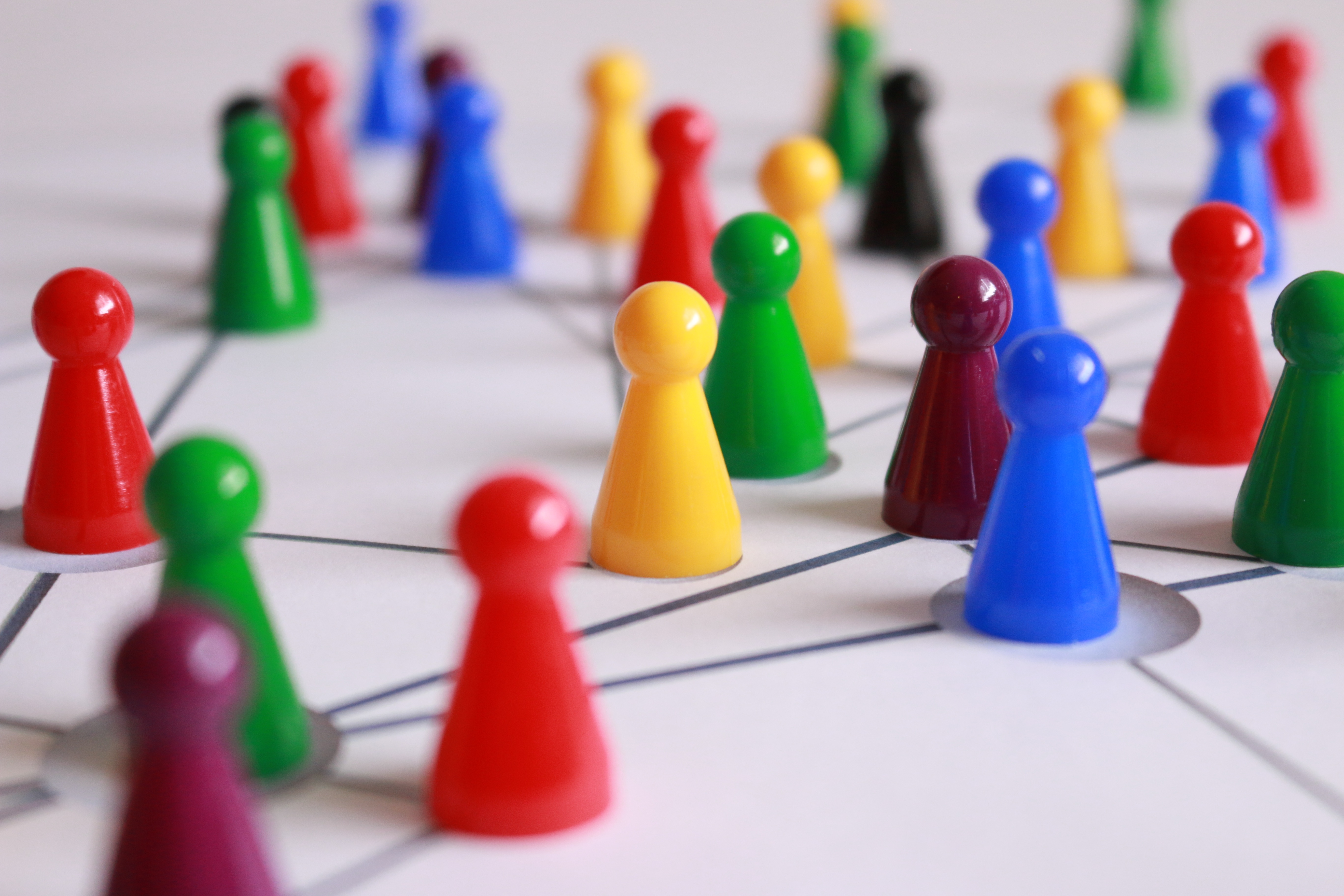 Multicoloured games pieces on a board